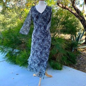 Black and white boho asymmetrical hem dress. $15